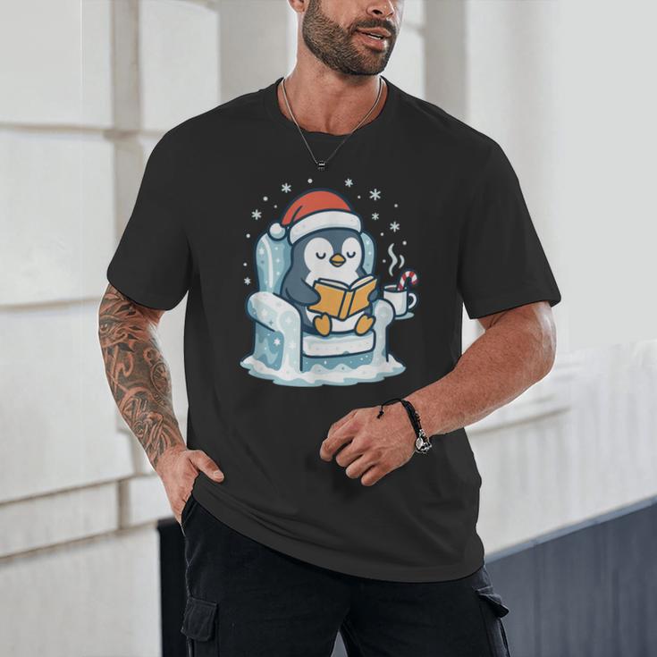 Cute Christmas Penguin Reading Book Cozy Winter Holiday Art Unisex T-Shirt Cute Christmas Penguin Reading Book Cozy Winter Holiday Art Unisex T-Shirt