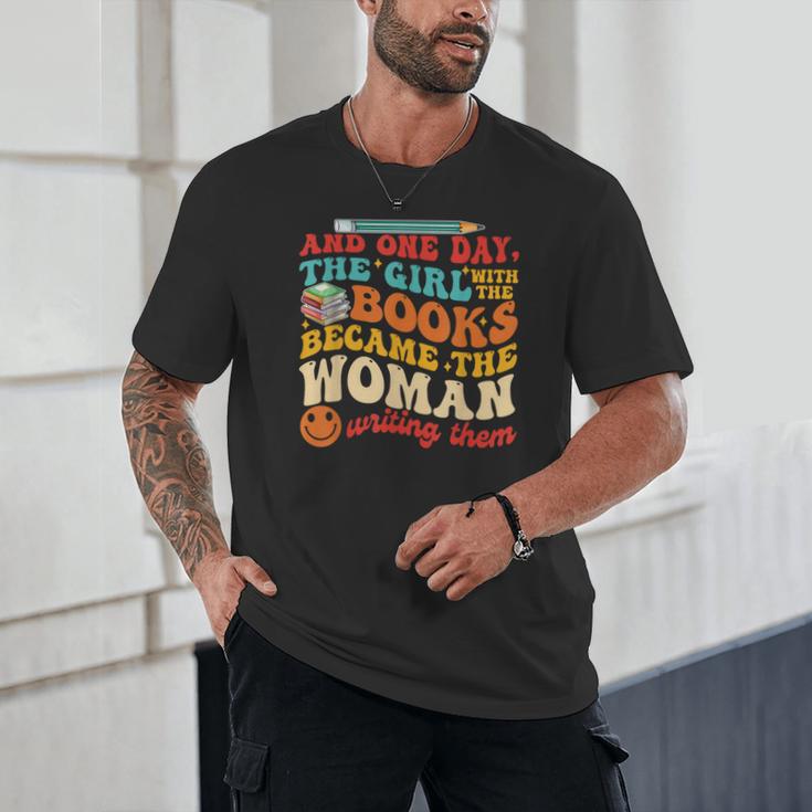 The Girl With The Books Became The Woman Writing Them Unisex T-Shirt The Girl With The Books Became The Woman Writing Them Unisex T-Shirt