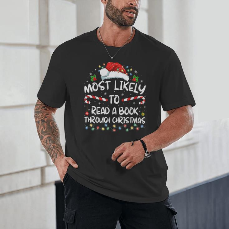 Most Likely To Read A Book Through Christmas Xmas Unisex T-Shirt Most Likely To Read A Book Through Christmas Xmas Unisex T-Shirt