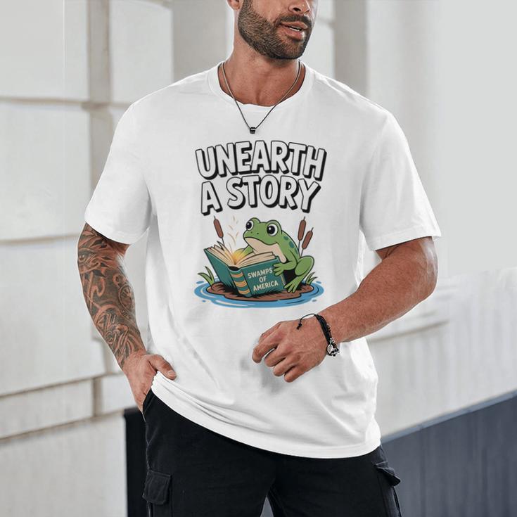 Unearth a Story Frog Reading a Book Summer 2026 Premium Tri-Blend Unisex T-Shirt