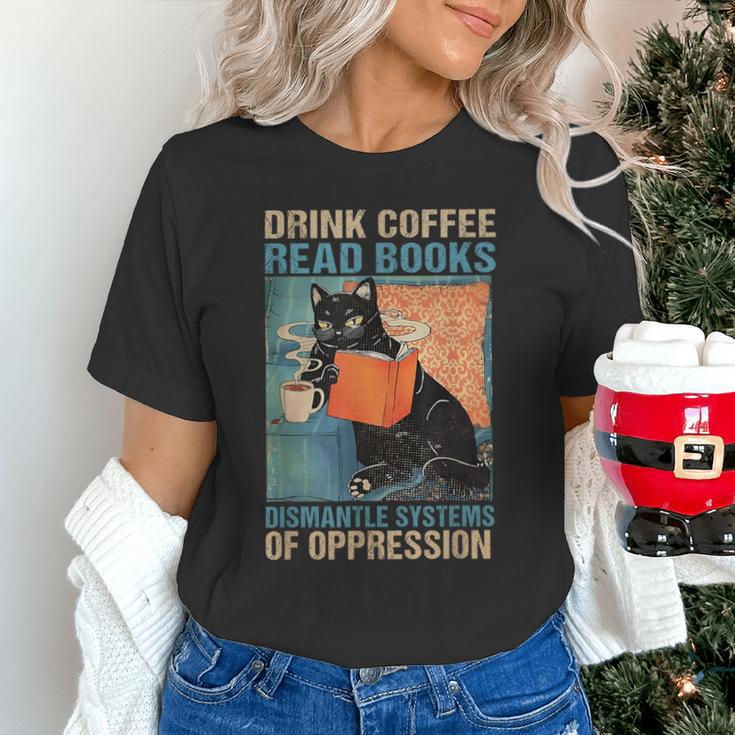 Drink Coffee Read Books Dismantle Systems Of Oppression Cat Unisex T-Shirt Drink Coffee Read Books Dismantle Systems Of Oppression Cat Unisex T-Shirt