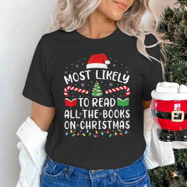 Most Likely To Read A Book On Christmas Family Matching Xmas Unisex T-Shirt Most Likely To Read A Book On Christmas Family Matching Xmas Unisex T-Shirt