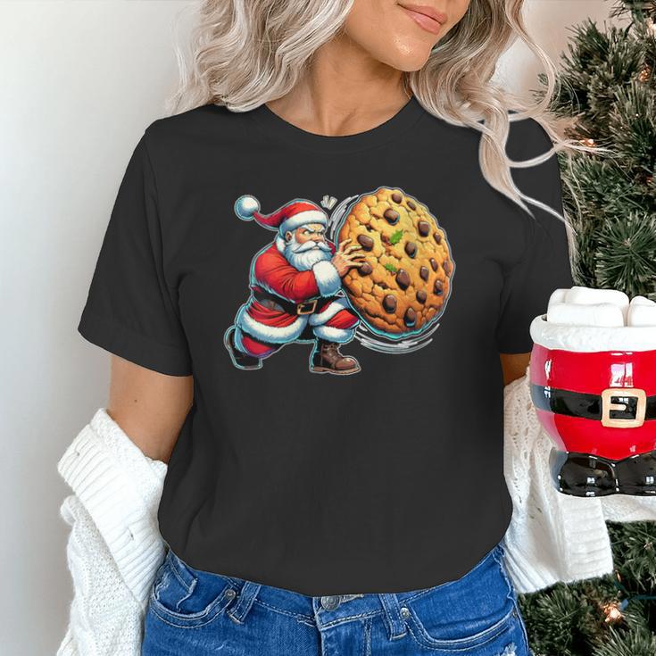 Santa Holding Cookie Xmas Baker Introvert Christmas Unisex T-Shirt Santa Holding Cookie Xmas Baker Introvert Christmas Unisex T-Shirt