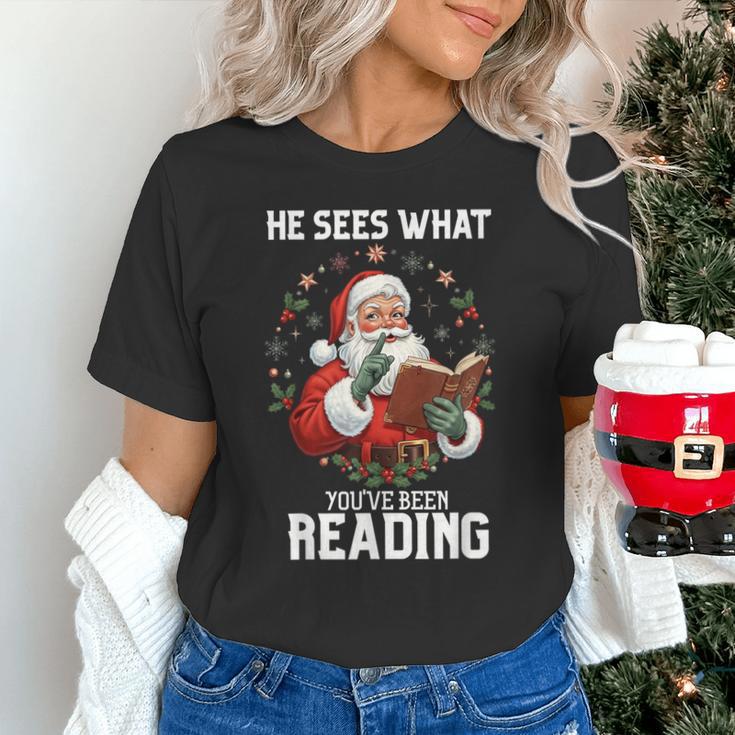 He Sees What You'Ve Been Reading Santa Book Lover Unisex T-Shirt He Sees What You'Ve Been Reading Santa Book Lover Unisex T-Shirt