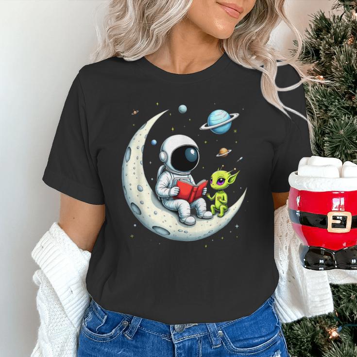 UFO Alien Astronaut Reading Book In Space Unisex T-Shirt