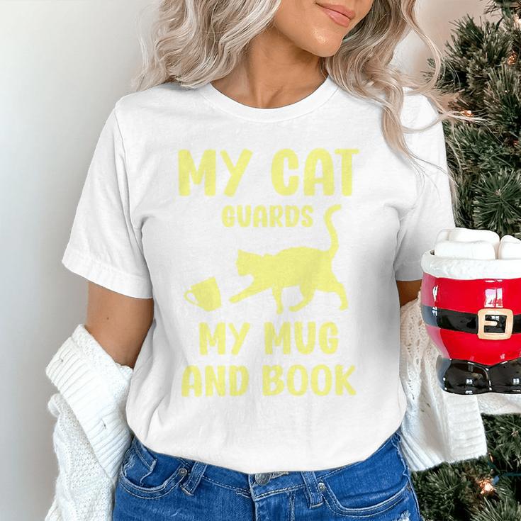 My Cat Guards My Mug And Book Humor Cats Premium Tri-Blend Unisex T-Shirt