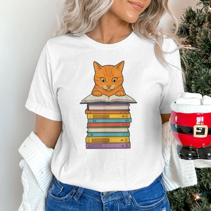Cute Orange Tabby Cat Reading On Pile Of Books Unisex T-Shirt Cute Orange Tabby Cat Reading On Pile Of Books Unisex T-Shirt
