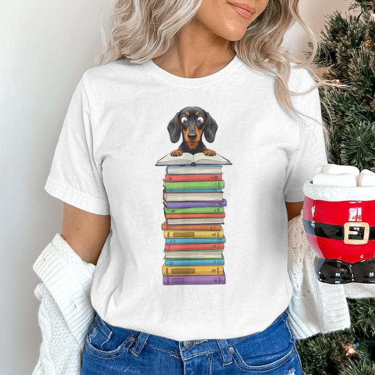 Cute Wiener Dog Dachshund Reading On Pile Of Books Unisex T-Shirt Cute Wiener Dog Dachshund Reading On Pile Of Books Unisex T-Shirt