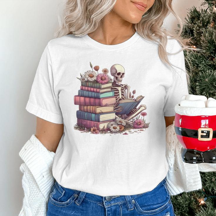 Reading A Book Per Day Keeps Reality Away Skeleton Books Unisex T-Shirt Reading A Book Per Day Keeps Reality Away Skeleton Books Unisex T-Shirt