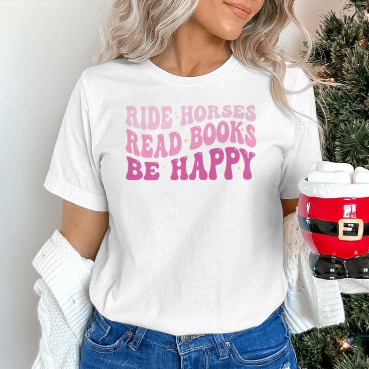 Ride Horses Read Books Be Happy Groovy Book Horse Premium Unisex T-Shirt Ride Horses Read Books Be Happy Groovy Book Horse Premium Unisex T-Shirt