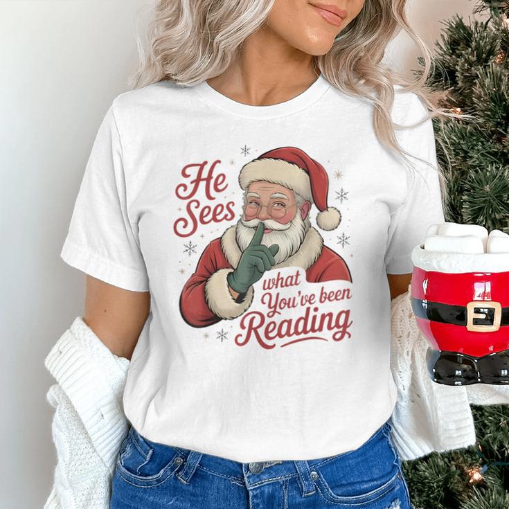 He Sees What You'Ve Been Reading Bookish Christmas Humor Unisex T-Shirt He Sees What You'Ve Been Reading Bookish Christmas Humor Unisex T-Shirt