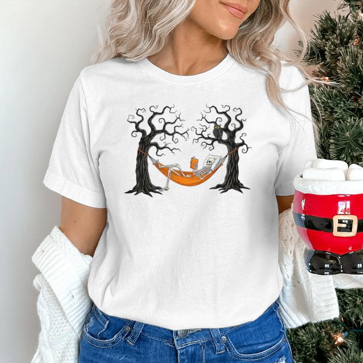 Skeleton Reading Book In Hammock Halloween Reader Unisex T-Shirt Skeleton Reading Book In Hammock Halloween Reader Unisex T-Shirt