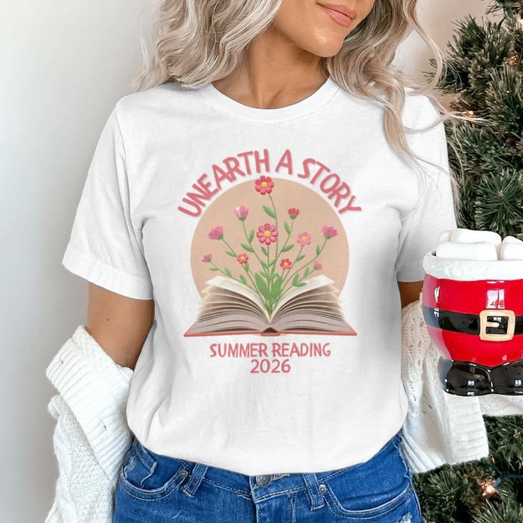 Unearth a Story 2026 Summer Reading Program Flowers Book Premium Tri-Blend Unisex T-Shirt