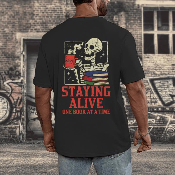 Staying Alive One Book At A Time Skeleton Reading Librarian Men's Back Print T-Shirt