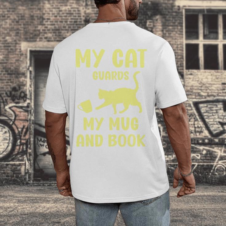 My Cat Guards My Mug And Book Humor Cats Premium Tri-Blend Men's Back Print T-Shirt My Cat Guards My Mug And Book Humor Cats Premium Tri-Blend Men's Back Print T-Shirt