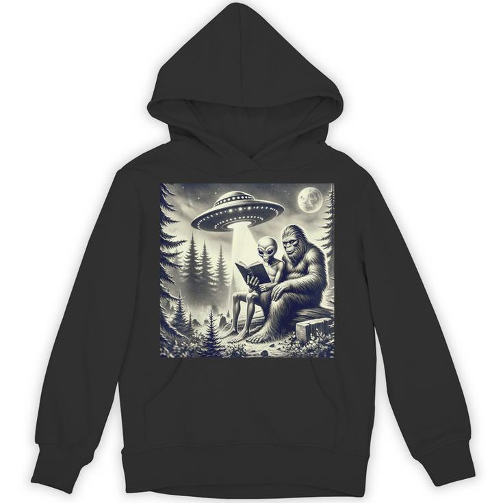 Bigfoot With Alien Reading A Book Bigfoot And UFO Unisex Hoodie
