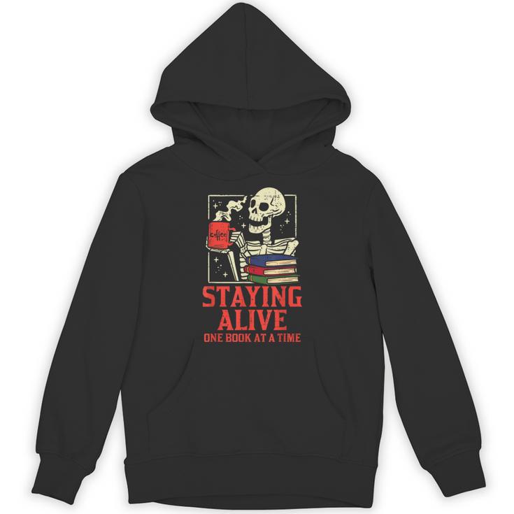 Staying Alive One Book At A Time Skeleton Reading Librarian Unisex Hoodie