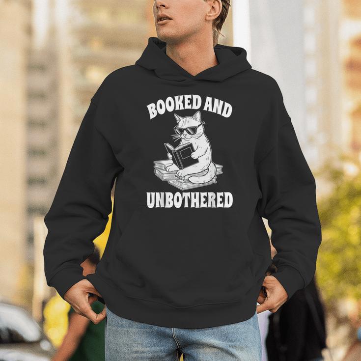 Booked And Unbothered Cat Reading Book Lovers Unisex Hoodie