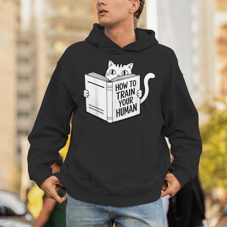 Cat Book Humor How To Train Your Human Unisex Hoodie