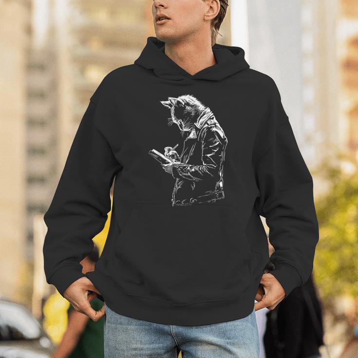 Cat Holds Book Writing Animal Print Motif Drawing Art Cat Unisex Hoodie Cat Holds Book Writing Animal Print Motif Drawing Art Cat Unisex Hoodie
