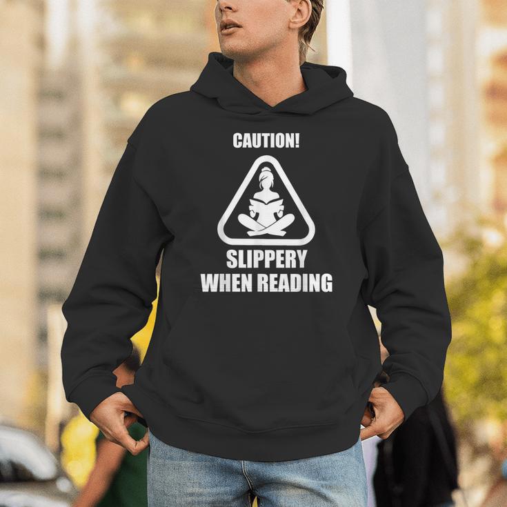 Caution Slippery When Reading Book Lover Unisex Hoodie Caution Slippery When Reading Book Lover Unisex Hoodie