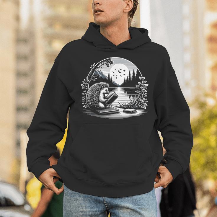 Hedgehog Reading Book Full Moon Lake Scenery Unisex Hoodie