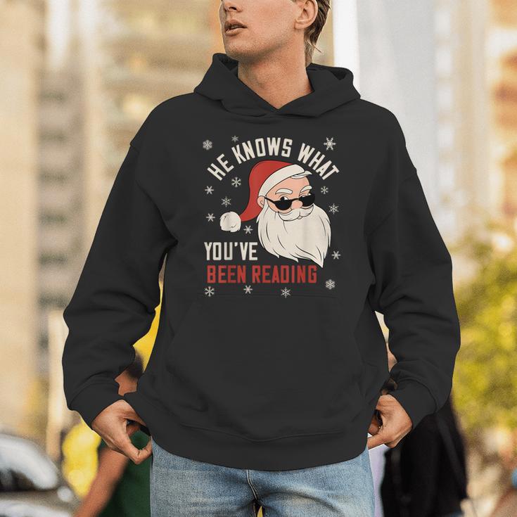 He Knows What You'Ve Been Reading Book Lover Women Santa Unisex Hoodie He Knows What You'Ve Been Reading Book Lover Women Santa Unisex Hoodie