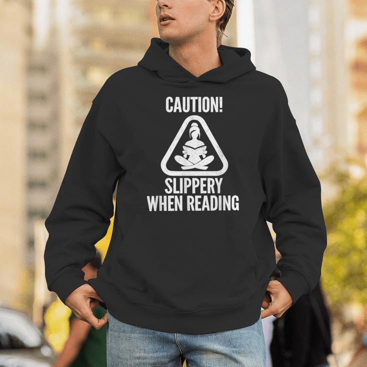 Slippery When Reading Unhinged Book Lover Meme Witty Unisex Hoodie Slippery When Reading Unhinged Book Lover Meme Witty Unisex Hoodie