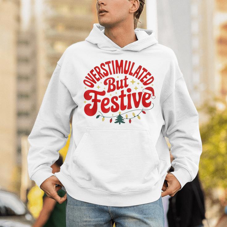 Overstimulated But Festive – Christmas Introvert Humor Unisex Hoodie