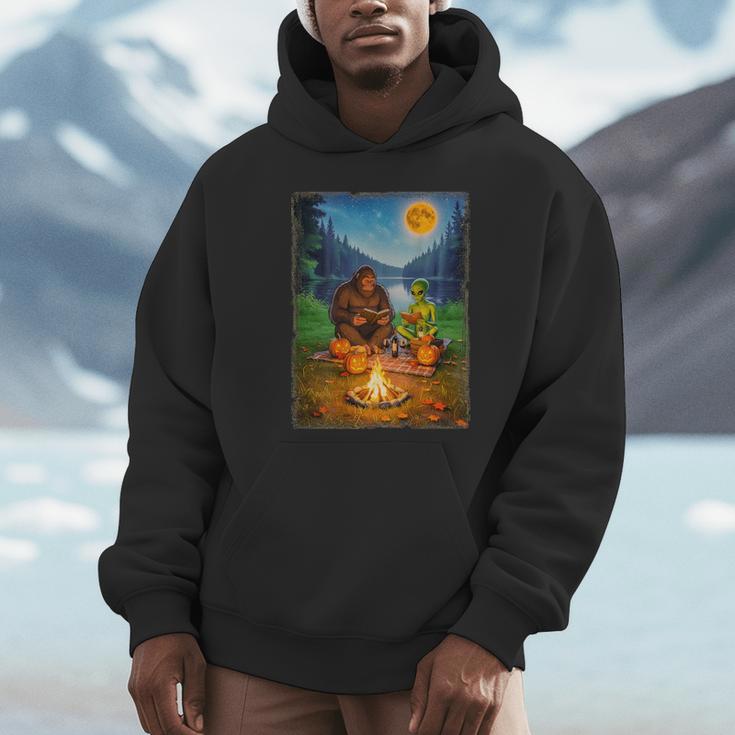 Bigfoot And Alien Reading Books Campfire Halloween Unisex Hoodie