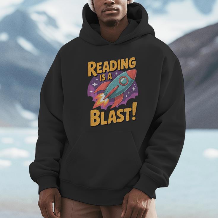 Book Lover Kids And Adults Reading Is a Blast Rocket Ship Unisex Hoodie