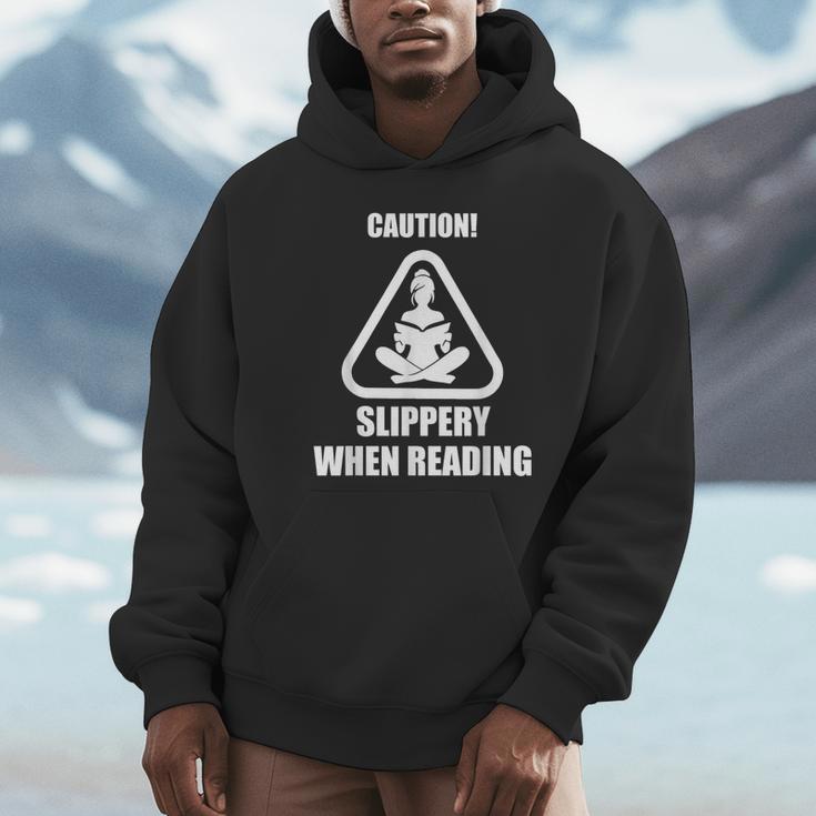 Caution Slippery When Reading Book Lover Unisex Hoodie Caution Slippery When Reading Book Lover Unisex Hoodie