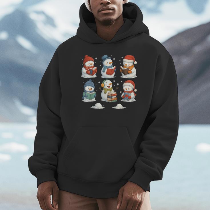 Cute Snowman Reading Books Christmas Winter Book Lover Unisex Hoodie Cute Snowman Reading Books Christmas Winter Book Lover Unisex Hoodie