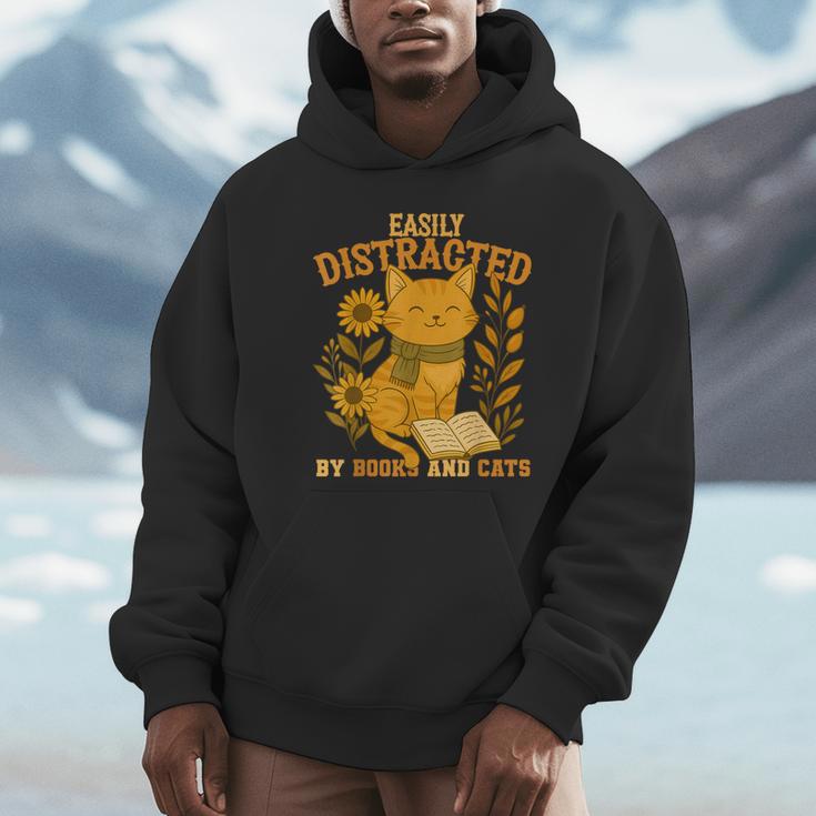 Easily Distracted By Cats And Books Cute Cat Book Lover Unisex Hoodie Easily Distracted By Cats And Books Cute Cat Book Lover Unisex Hoodie
