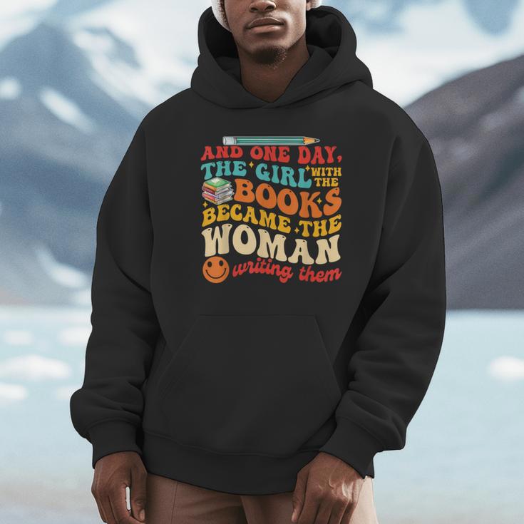 The Girl With The Books Became The Woman Writing Them Unisex Hoodie