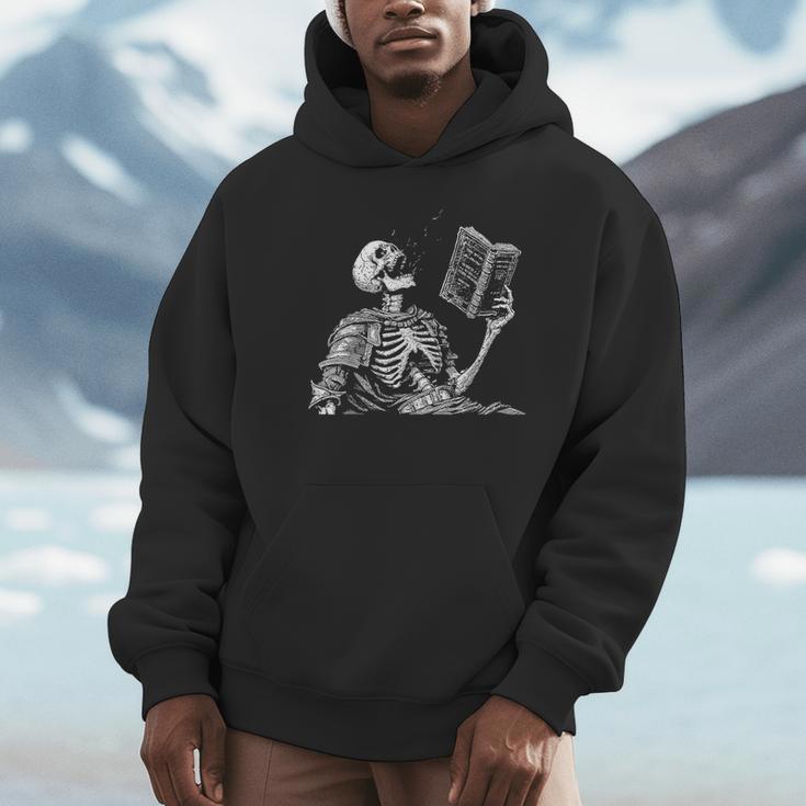 Hilarious Skeleton Holding a Book And Laughing Gothic Unisex Hoodie