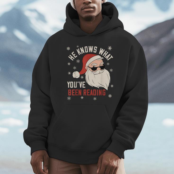 He Knows What You'Ve Been Reading Book Lover Women Santa Unisex Hoodie He Knows What You'Ve Been Reading Book Lover Women Santa Unisex Hoodie