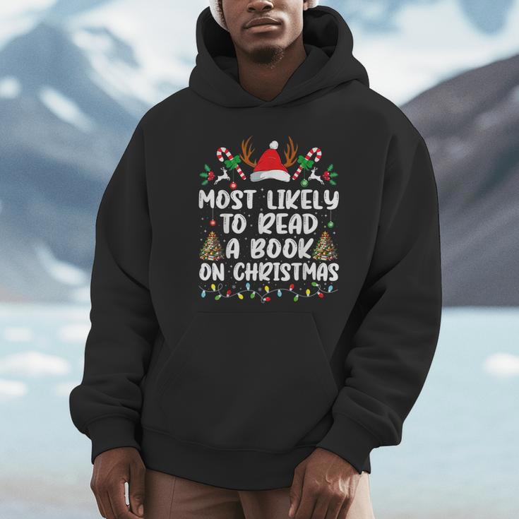 Most Likely To Read A Book On Christmas Matching Family Unisex Hoodie