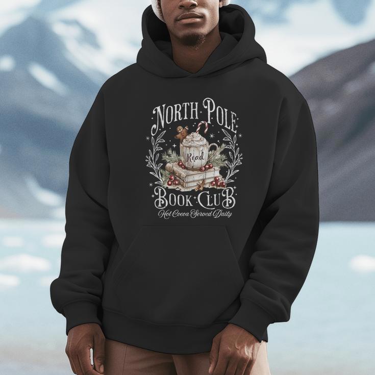 North Pole Book Club Hot Cocoa Served Daily Unisex Hoodie