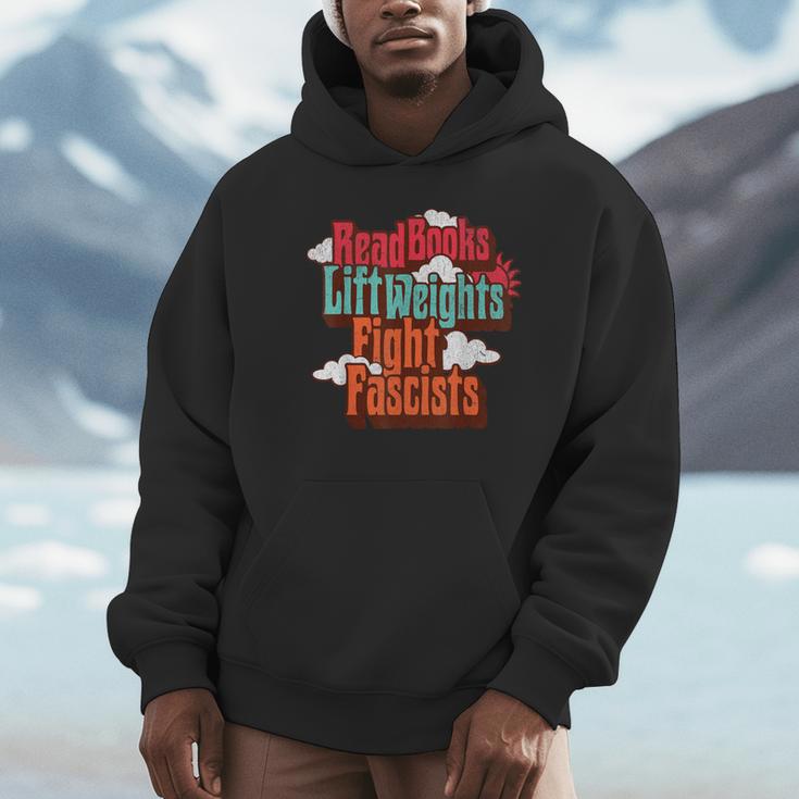 Read Books Lift Weights Fight Fascists Reading No Kings Unisex Hoodie