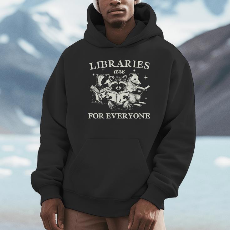 Retro Libraries Are For Everyone Racoon Reading Book Lover Unisex Hoodie Retro Libraries Are For Everyone Racoon Reading Book Lover Unisex Hoodie