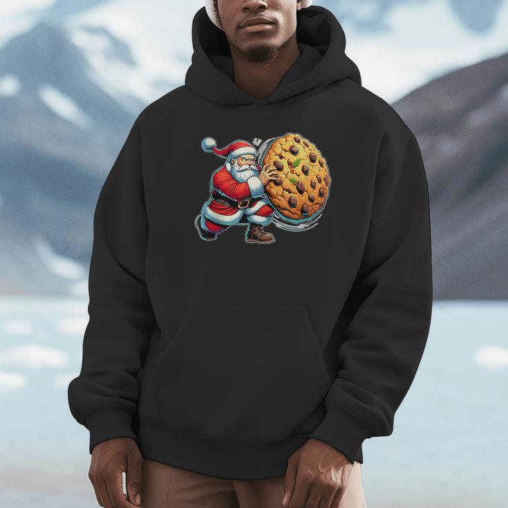 Santa Holding Cookie Xmas Baker Introvert Christmas Unisex Hoodie