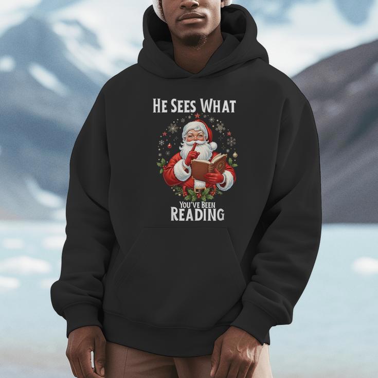 He Sees What You'Ve Been Reading Santa Book Lover For Women Unisex Hoodie