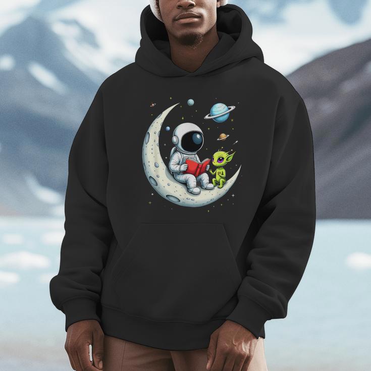UFO Alien Astronaut Reading Book In Space Unisex Hoodie