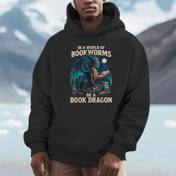 In a World Of Bookworms Be a Book Dragon Reading Unisex Hoodie