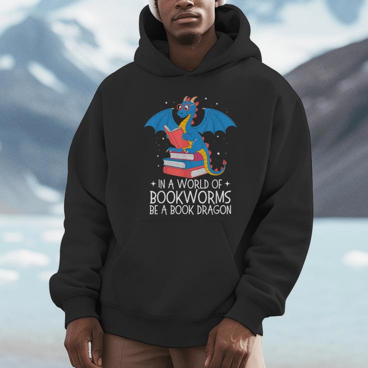 In A World Full Of Bookworms Be A Book Dragon Reading Unisex Hoodie