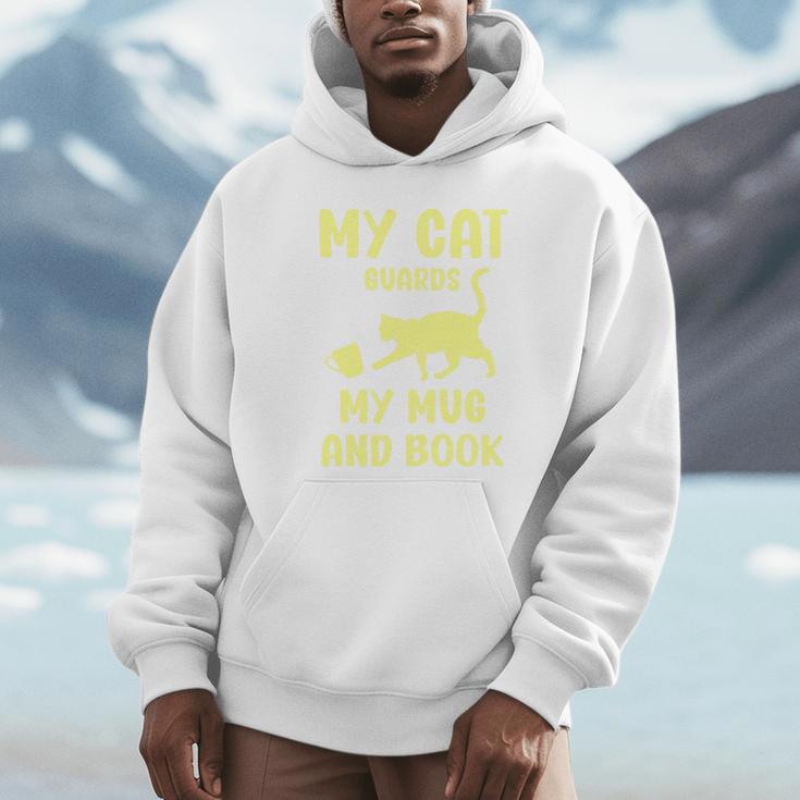 My Cat Guards My Mug And Book Humor Cats Premium Tri-Blend Unisex Hoodie My Cat Guards My Mug And Book Humor Cats Premium Tri-Blend Unisex Hoodie