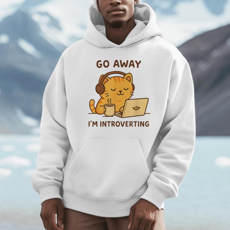 Go Away I'm Introverting Cozy Cat With Laptop And Coffee Unisex Hoodie Go Away I'm Introverting Cozy Cat With Laptop And Coffee Unisex Hoodie