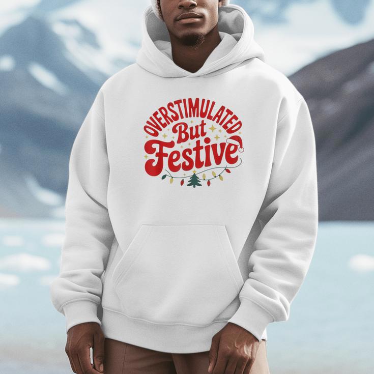 Overstimulated But Festive – Christmas Introvert Humor Unisex Hoodie