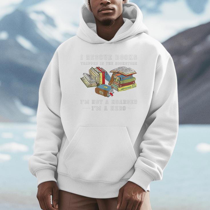 I Rescue Book Trapped In The Bookstore I'm Not A Hoarder Premium Tri-Blend Unisex Hoodie I Rescue Book Trapped In The Bookstore I'm Not A Hoarder Premium Tri-Blend Unisex Hoodie